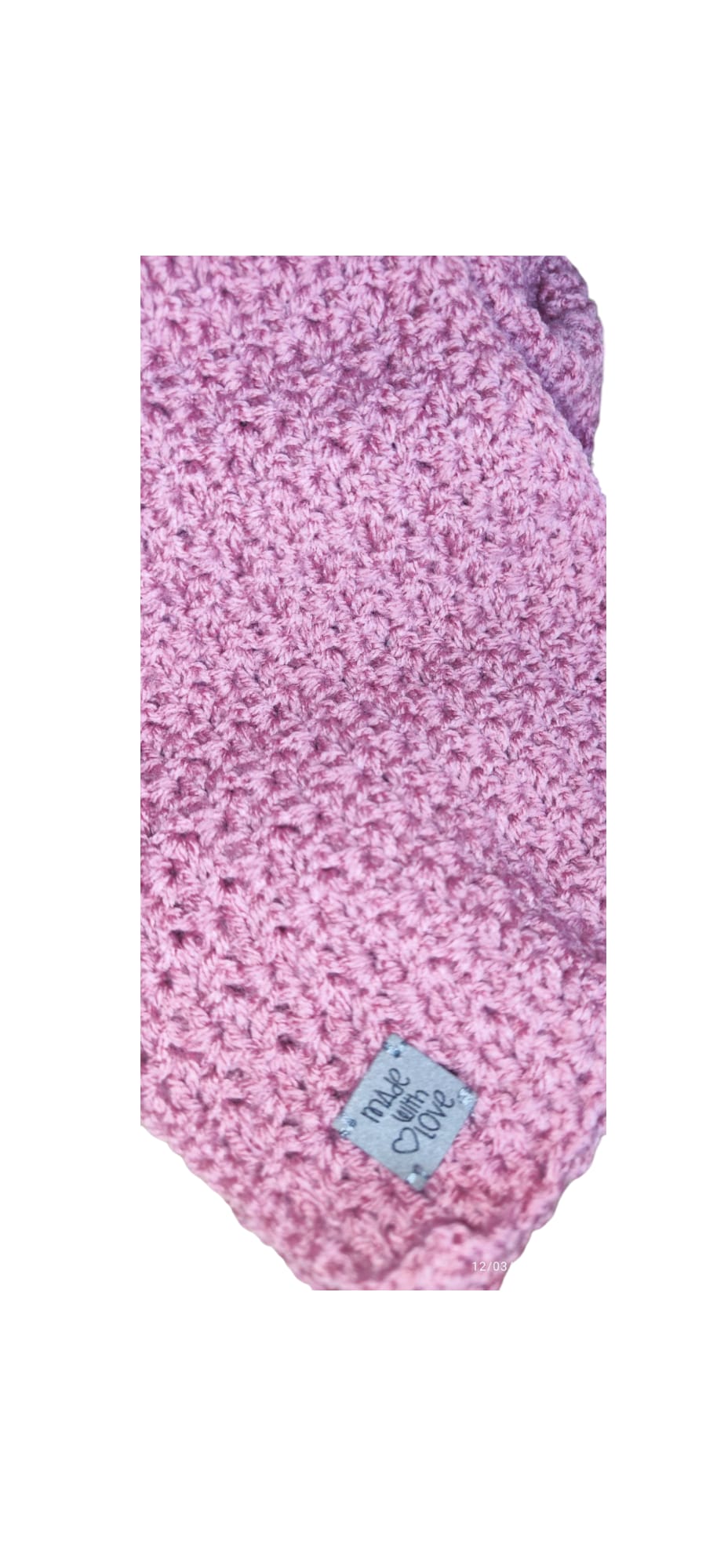 Angled view of the Blush Rose crochet winter set showing the elegant drape of the scarf and slouchy shape of the beanie