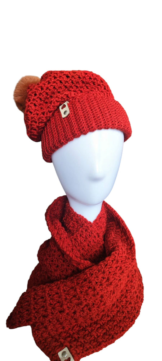 Flat lay of the handmade Brick Comfort Set showing the cozy red slouchy beanie and matching infinity scarf