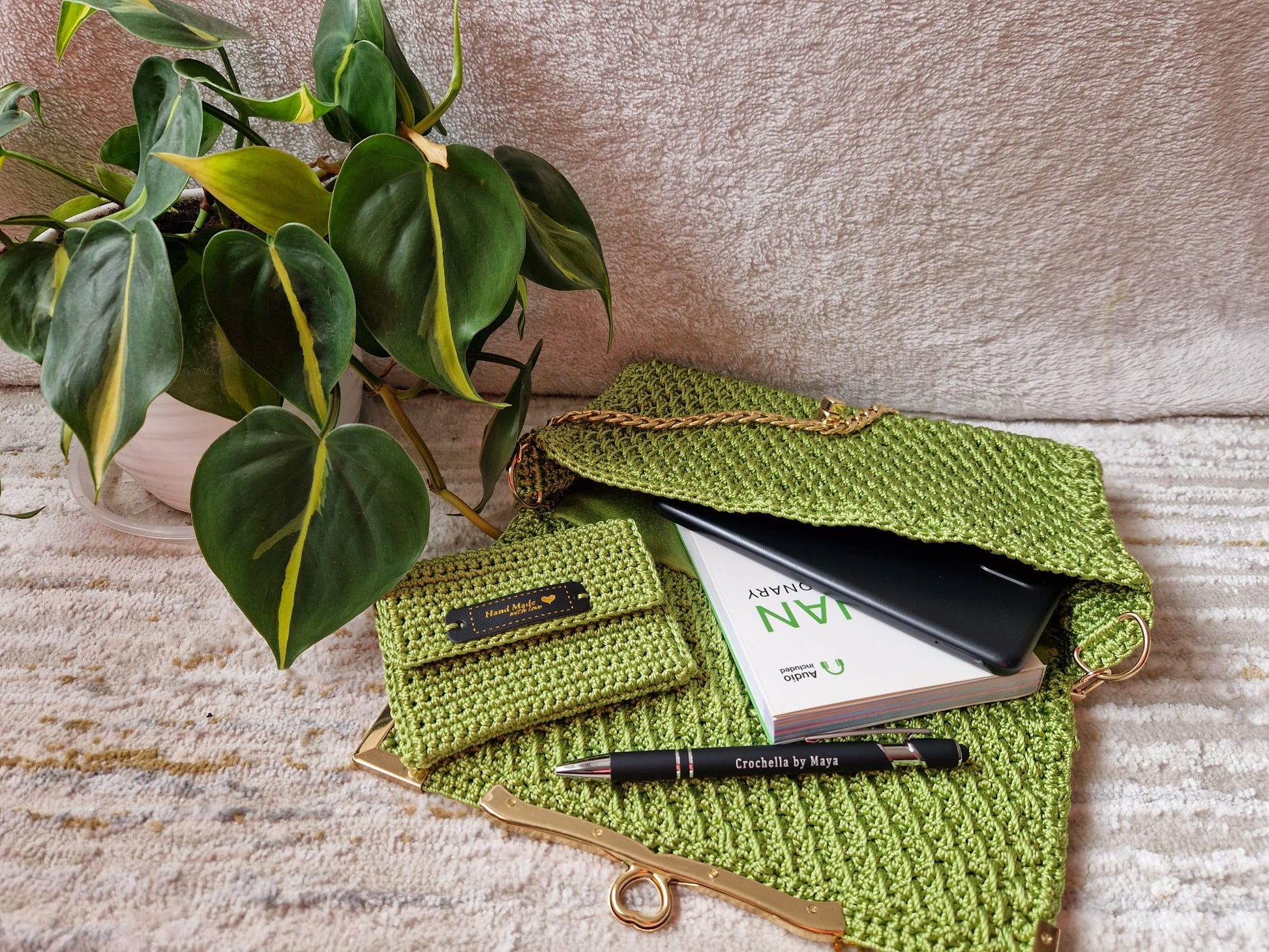 Angled view of the green Diamond Luxe Bag highlighting its 3D crochet texture and rich sheen.