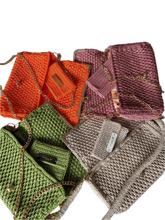 Full group view of Diamond Luxe bags showing their unique crochet texture, metallic details, and bold colors.