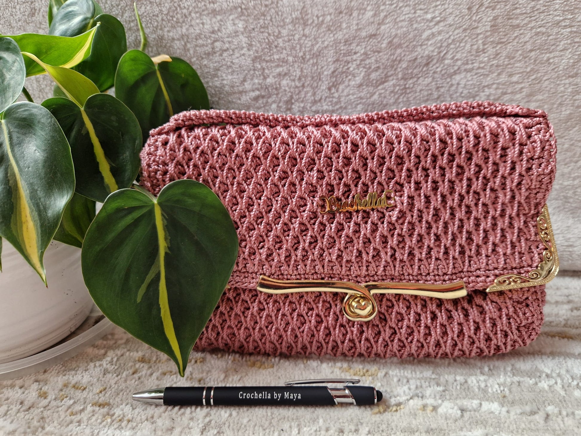 Pink Diamond Luxe Crochet Bag in a rich berry shade, designed with elegant diamond weave and structured shape.
