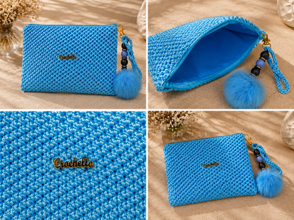 Blue textured pouch with pom-pom details on a beige surface
