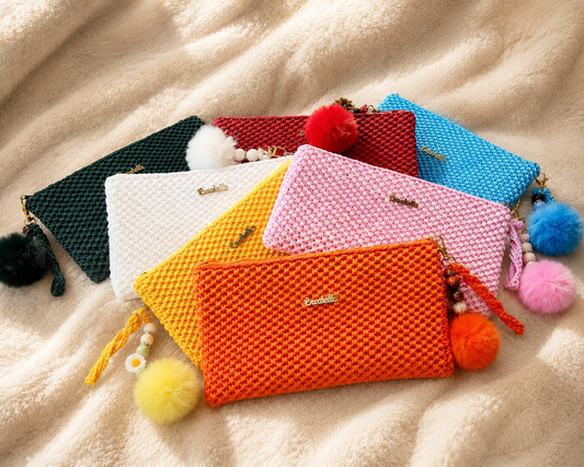 Handmade blue crochet pouch with textured stitching and relaxed luxury styling